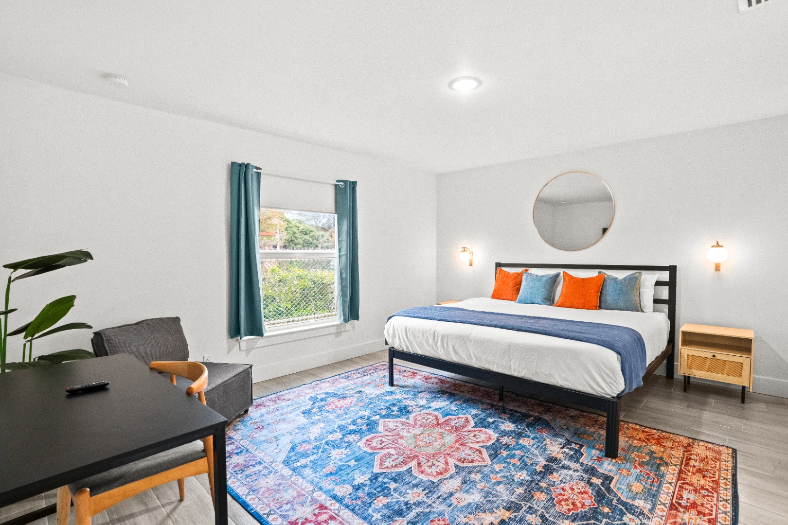 Queen bedroom with natural light